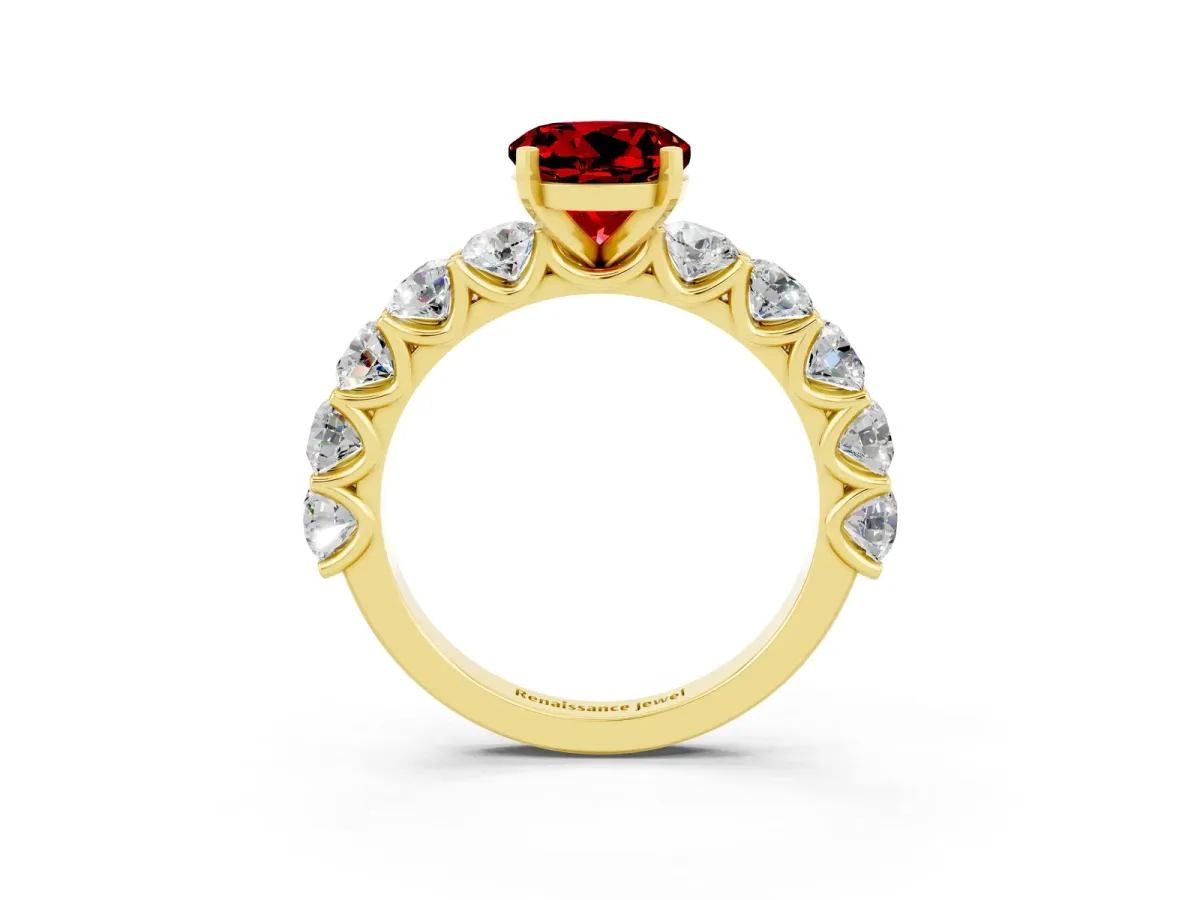 Round Cut Ruby Prong Setting with Side Stones on a Pave Band Yellow gold