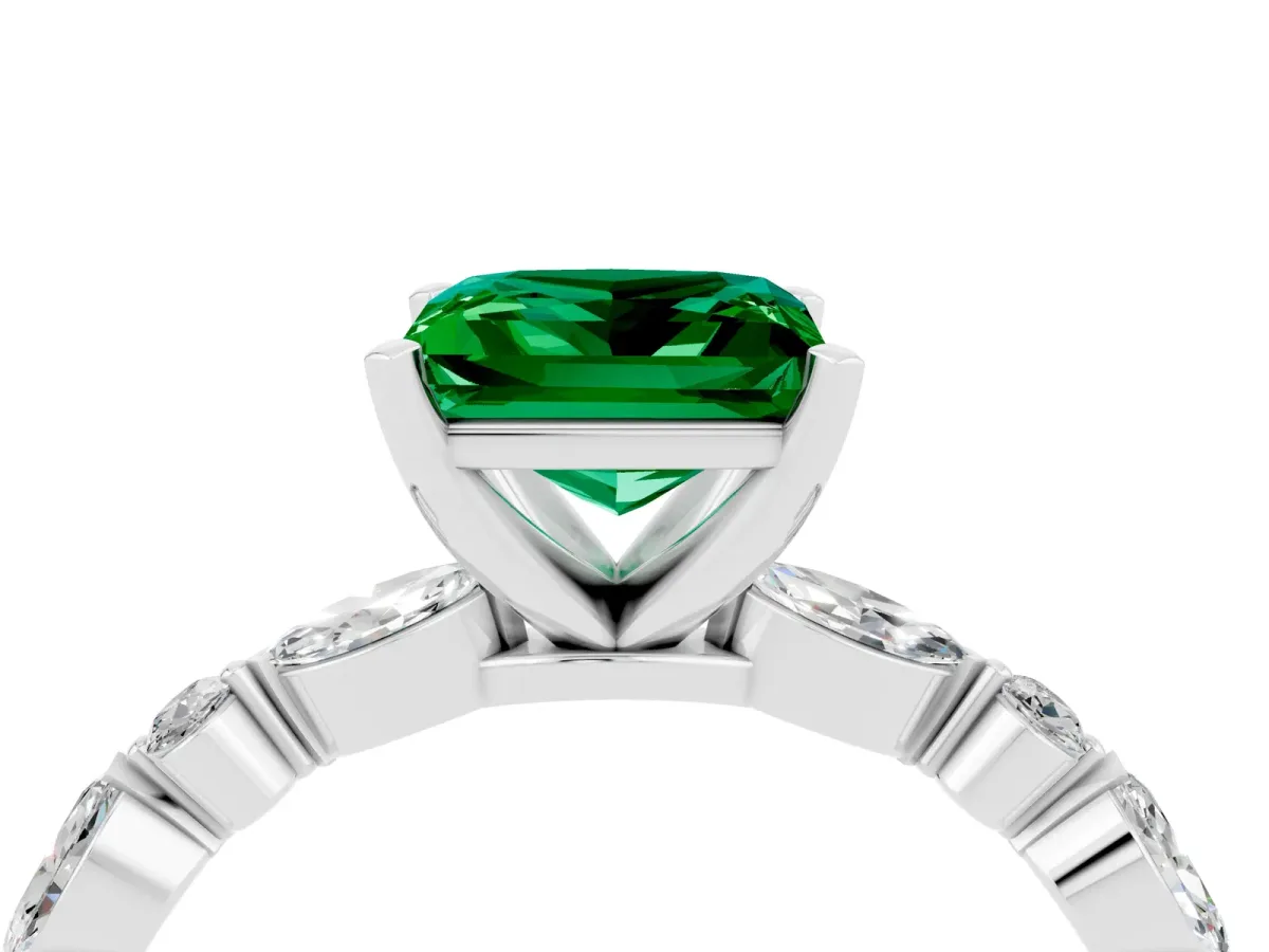 Princess Cut Emerald Ring with Marquise and Round Side Stones and Four-Prong Setting Silver