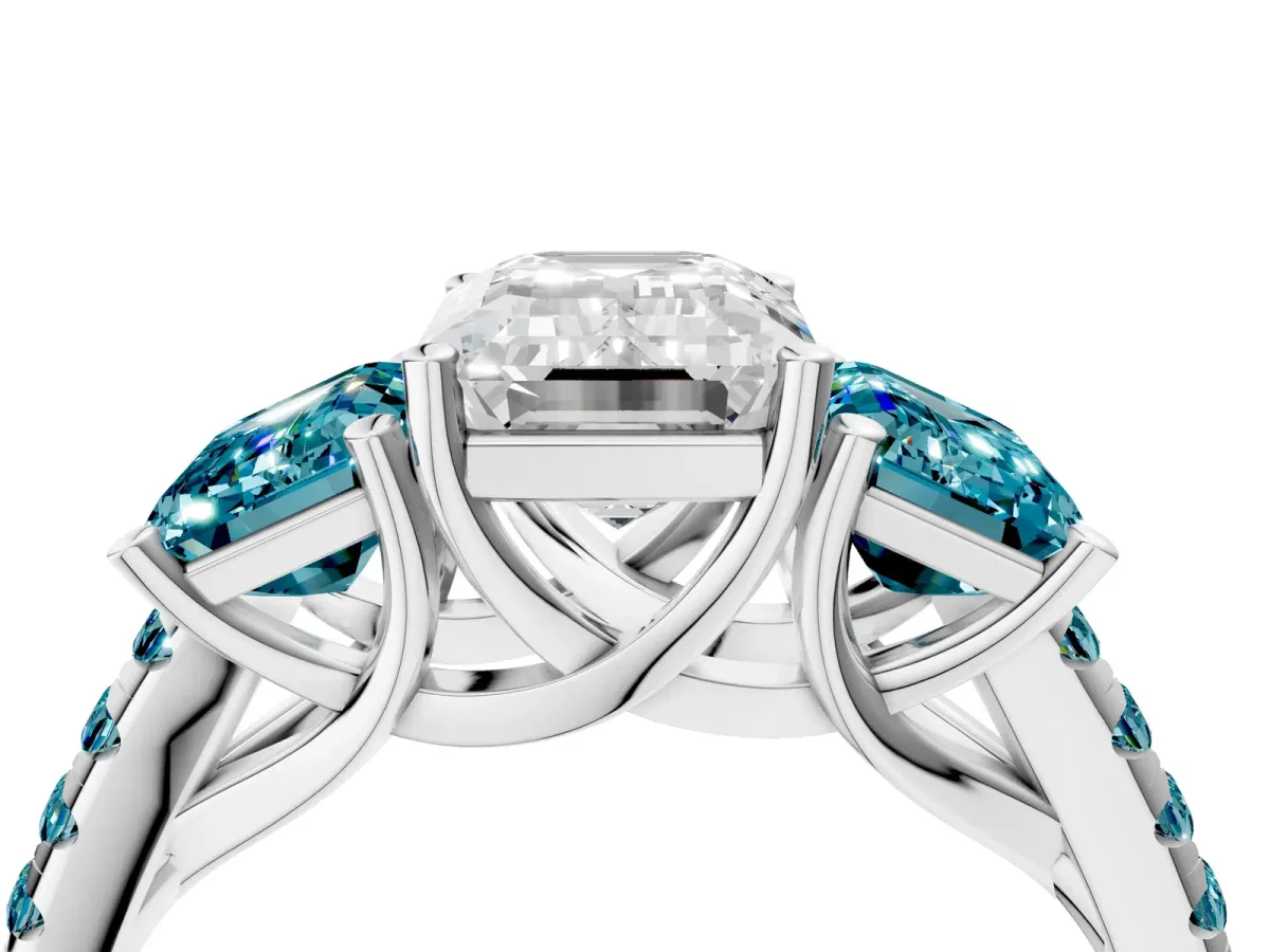 Three-Stone Emerald Cut Diamond Ring with Round Blue Topaz Pavé Band and Prong Setting Silver