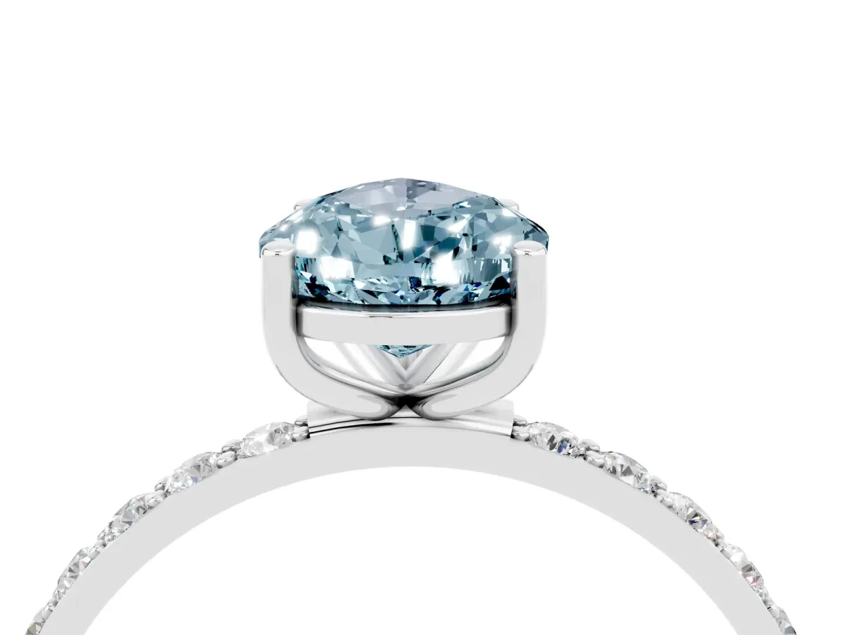 Pear Cut Aquamarine Solitaire Ring with Round Pavé Band and Prong Setting Silver