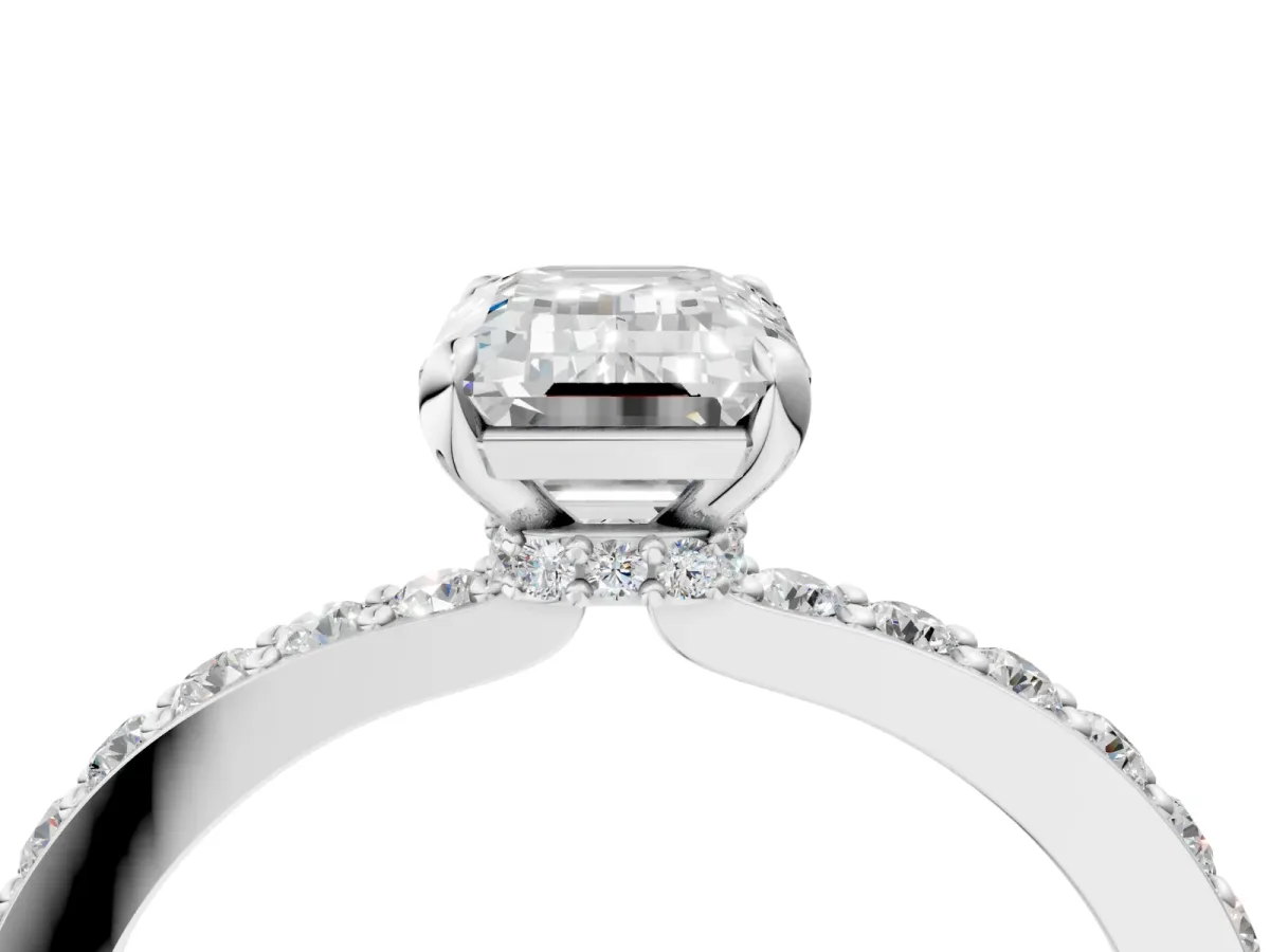 Emerald Cut Diamond Solitaire Engagement Ring with Pavé Band and Four-Prong Setting Silver