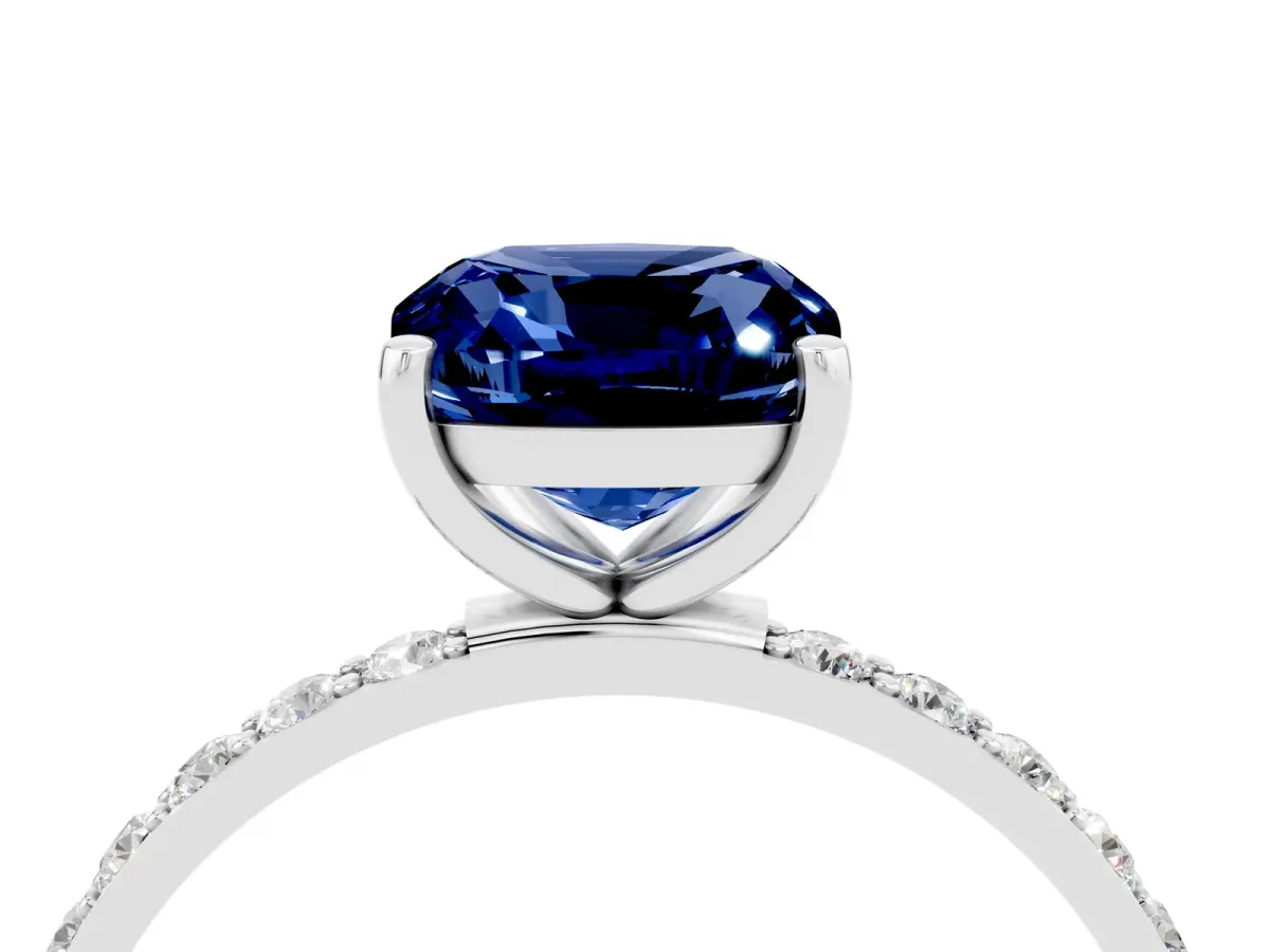 Cushion Cut Blue Sapphire Solitaire Ring with Round Pavé Band and Prong Setting Silver