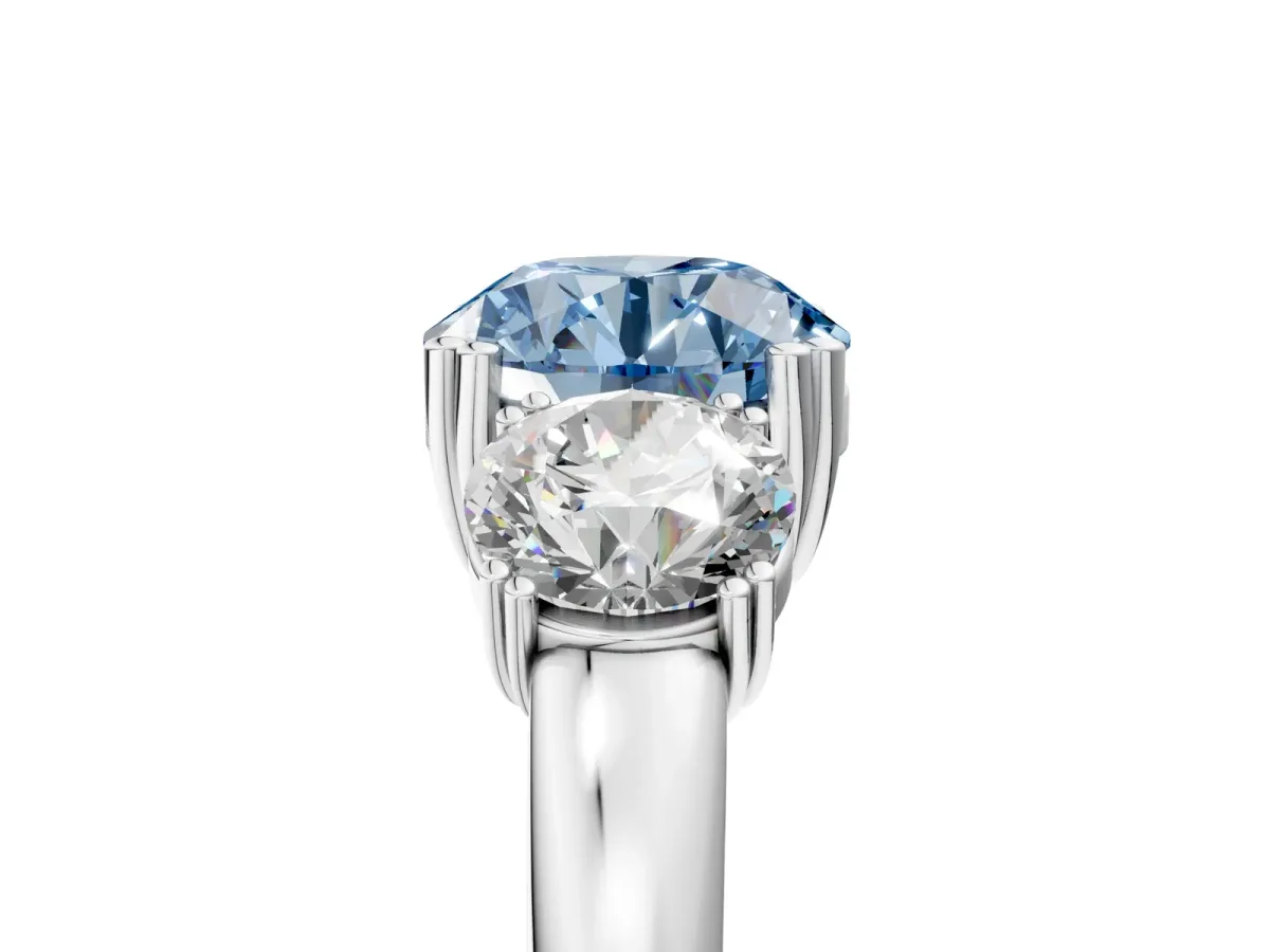 Fancy Blue Three-Stone Round Cut Cut Diamond Ring with Channel Set Band and Four-Prong Setting Silver