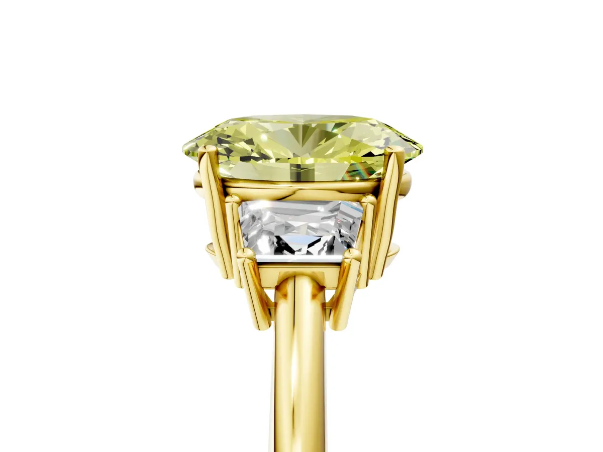Fancy Yellow Oval Cut Diamond Three-Stone Ring with Trapezoid Side Stones and Prong Setting Yellow gold