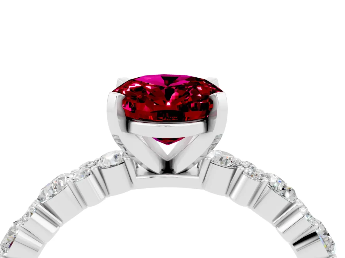 Oval Cut Garnet Side Stone Solitaire Ring with Round and Four-Prong Setting Platinum