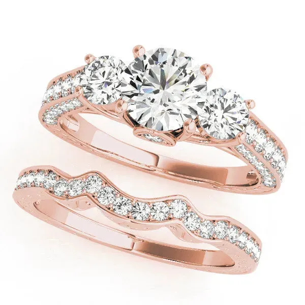 Three-Stone Round Cut Cut Diamond Engagement Ring with Split Shank and Prong Setting Rose gold