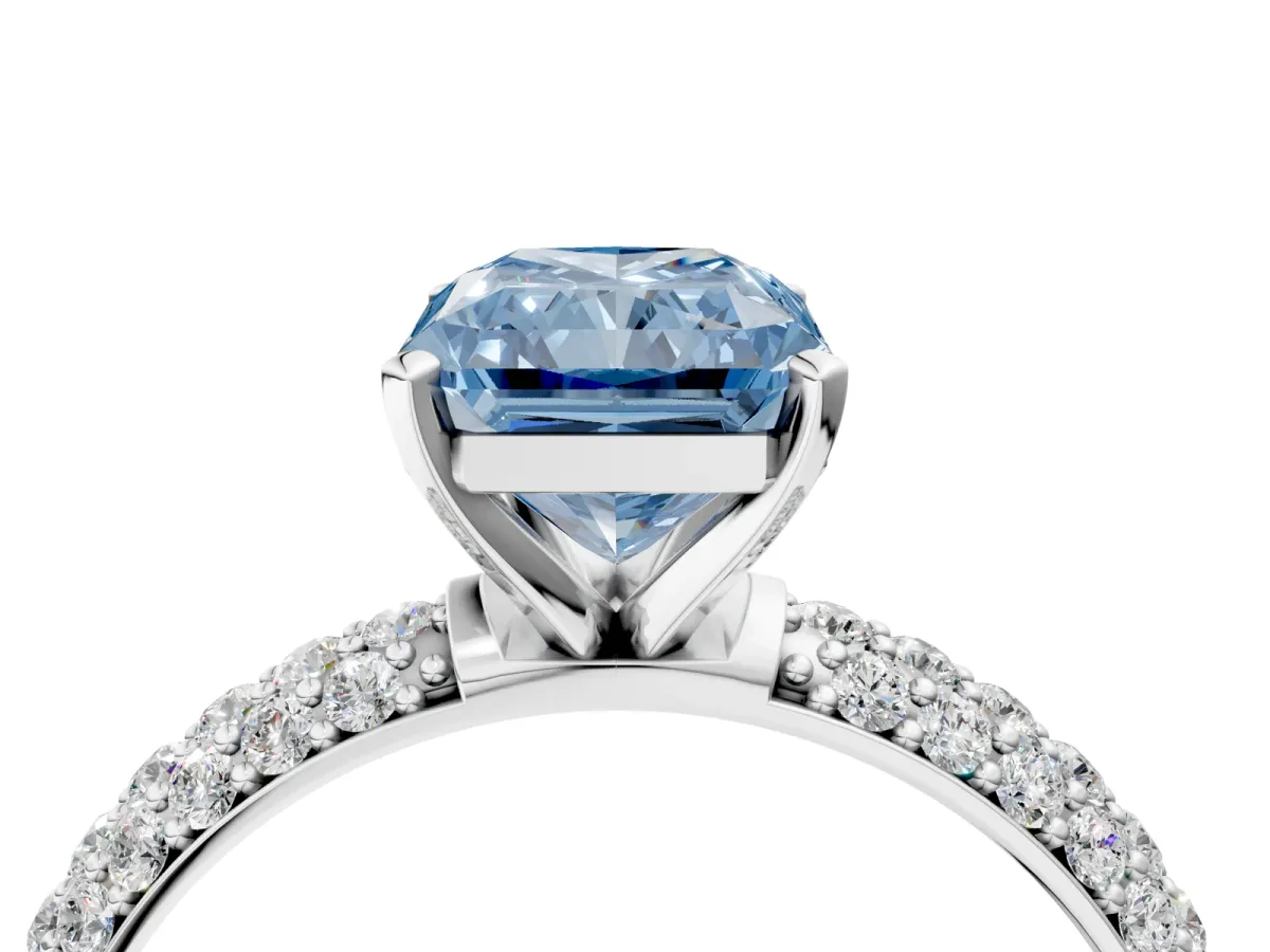 Fancy Blue Radiant Cut Diamond Solitaire Ring with Prong Setting and Pavé Band Platinum