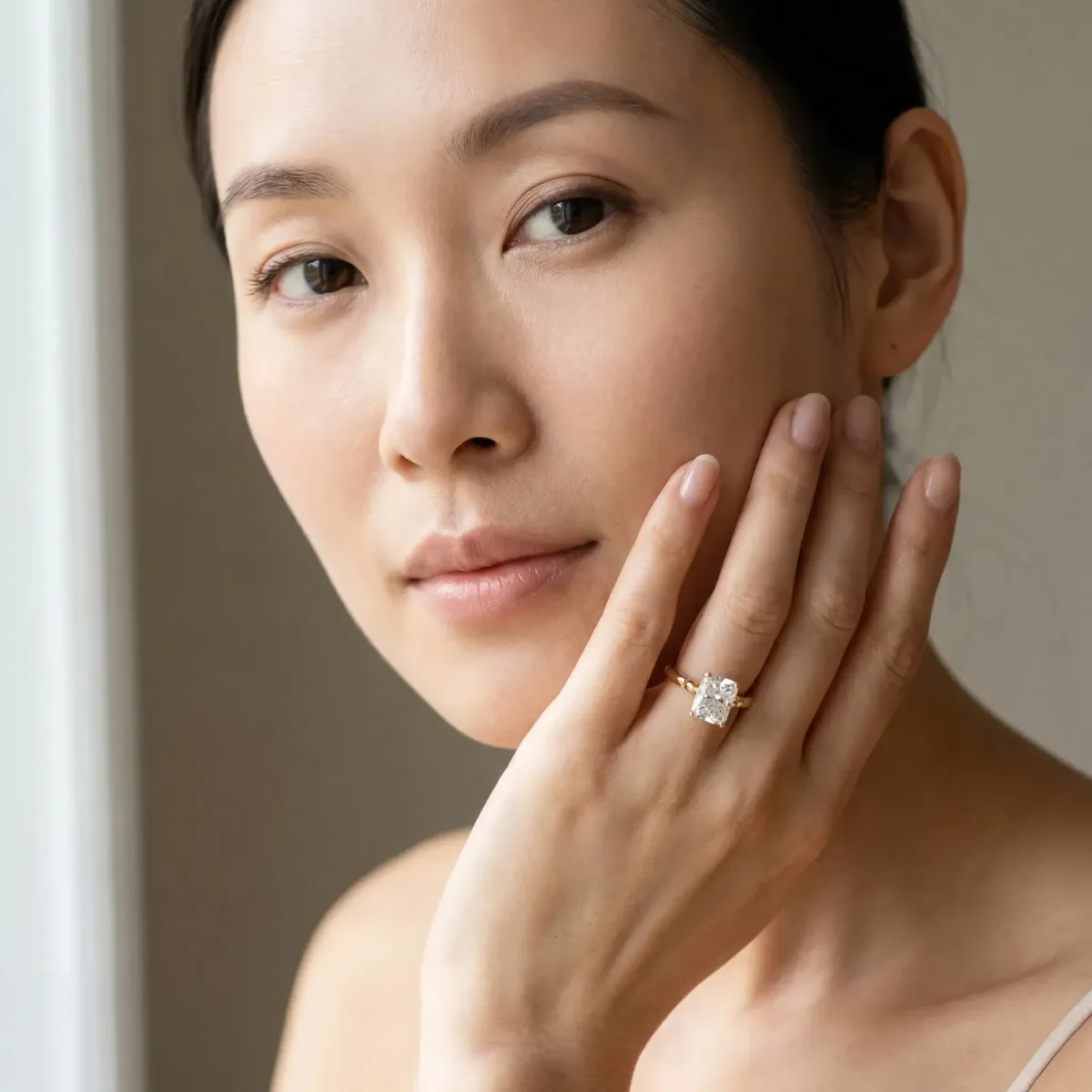 Radiant Cut Solitaire Beaded Band with Four-Prong Setting Yellow gold