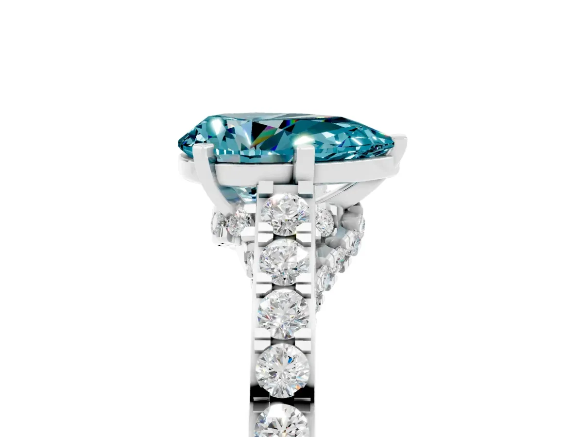 Pear Cut Blue Topaz Solitaire Ring with Crossover Gallery and Round Pavé Band Silver