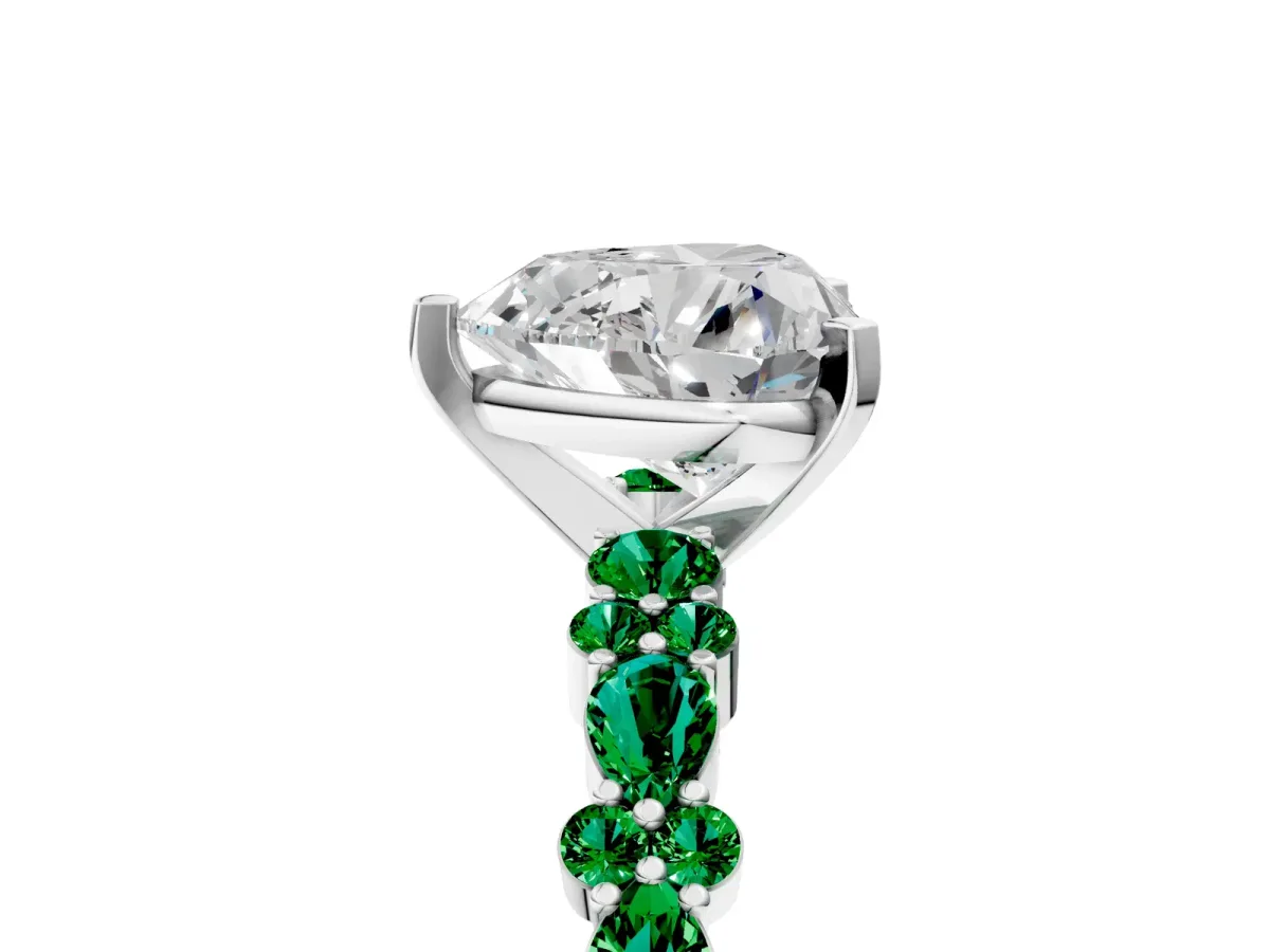 Heart Cut Diamond Side Stone Solitaire Ring with Round Emerald and Four-Prong Setting Platinum