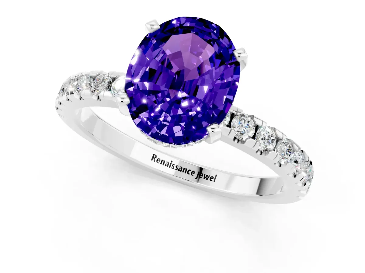 Oval Cut Tanzanite Solitaire Ring with Round Pavé Band and Four-Prong Setting Silver