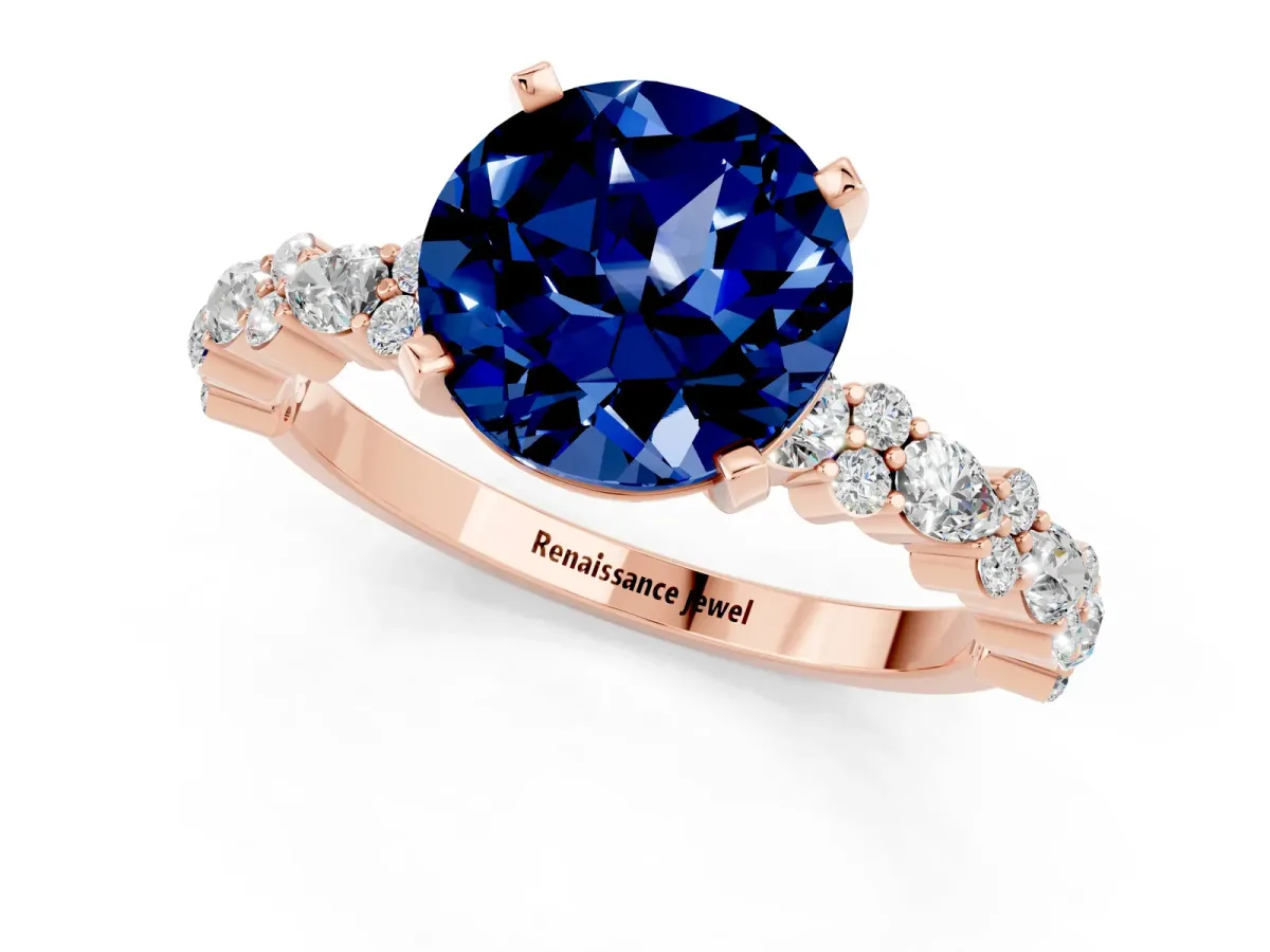Round Cut Blue Sapphire Side Stone Solitaire Ring with Round and Four-Prong Setting Rose gold