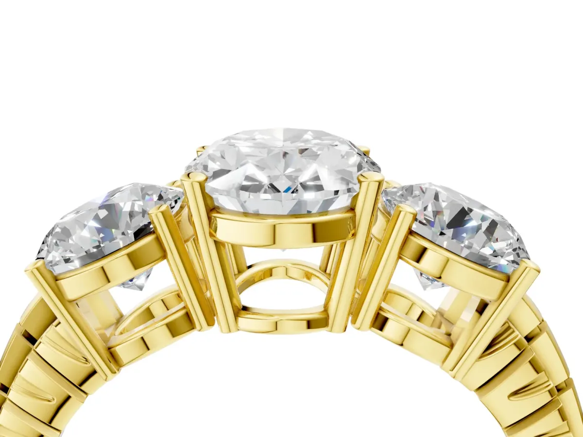 Three-Stone Oval Cut Cut Diamond Ring with Channel-Set Band and Prong Setting Yellow gold