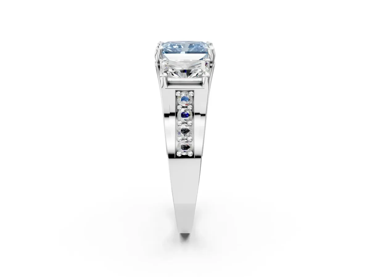 Fancy Blue Radiant Cut Diamond Three-Stone Ring with Channel Set Band and Four-Prong Setting Platinum