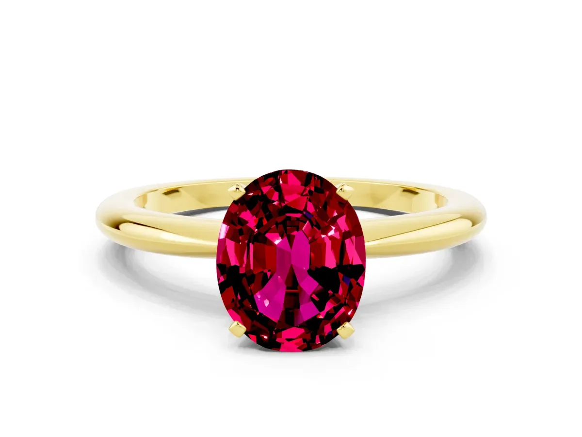Oval Cut Garnet Solitaire Ring with Six-Prong Setting and Classic Band Yellow gold