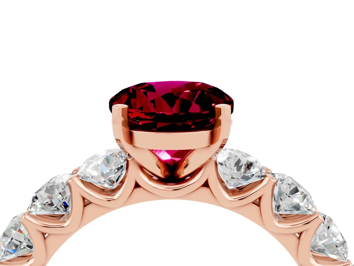 Round Cut Garnet Prong Setting with Side Stones on a Pave Band Rose gold
