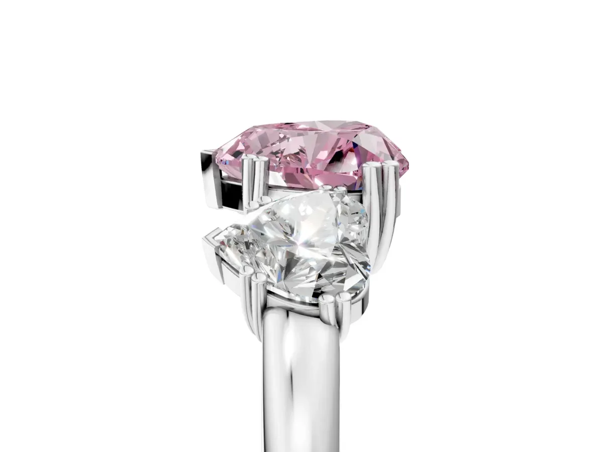 Fancy Pink Three-Stone Heart Cut Cut Diamond Ring with Channel Set Band and Four-Prong Setting Silver