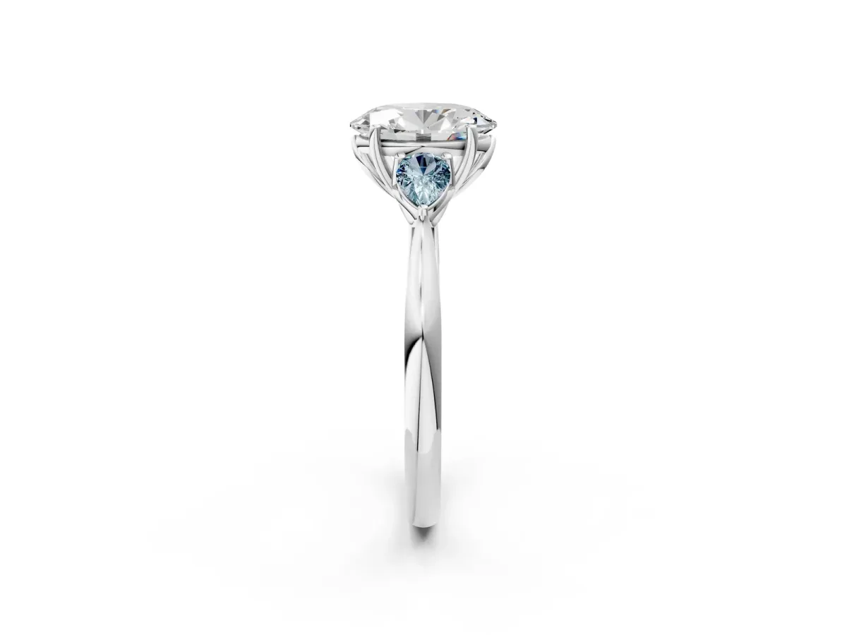 Oval Cut Diamond Three-Stone Ring with Pear Aquamarine Side Stones and Prong Setting White gold