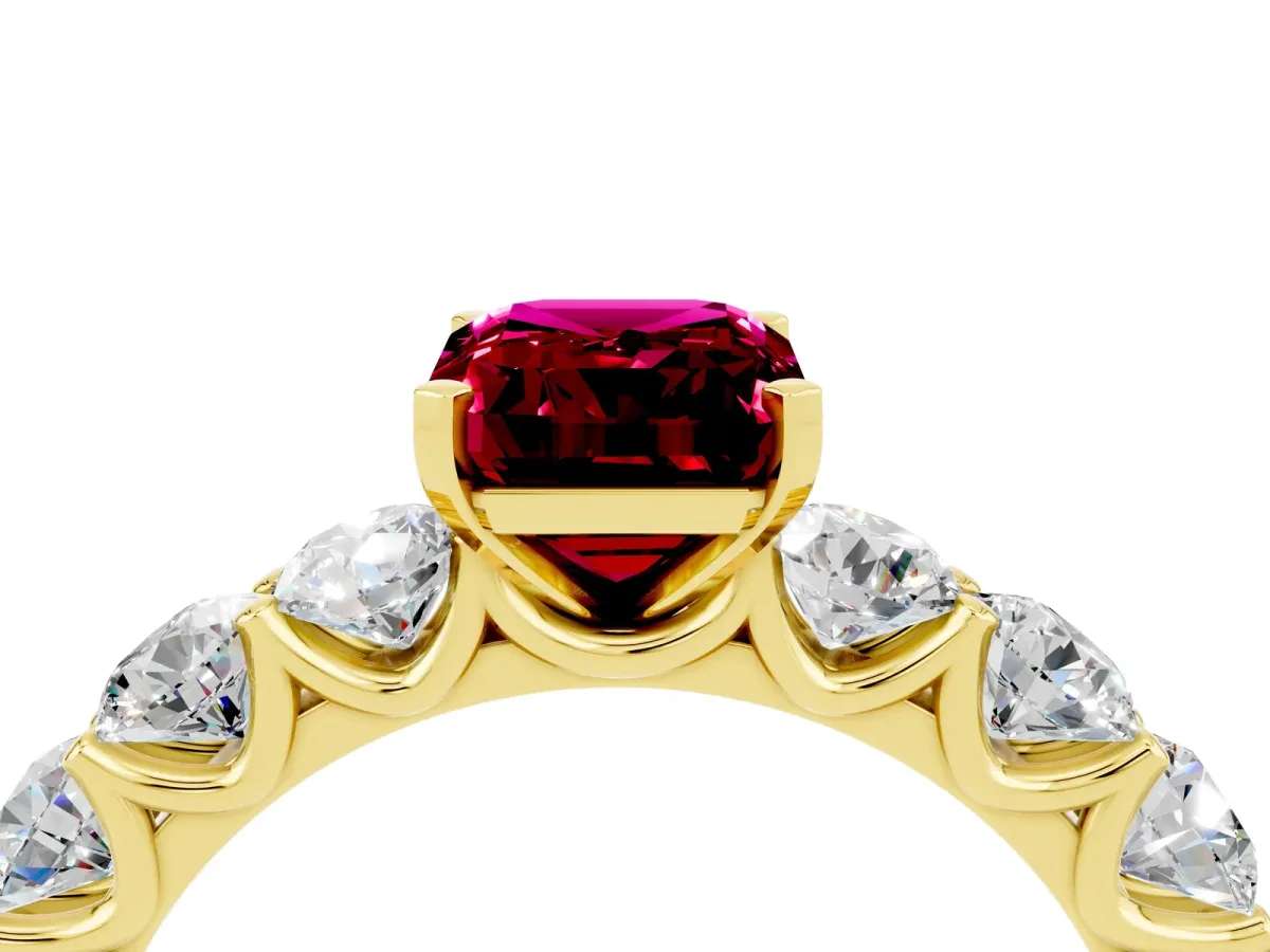 Emerald Cut Garnet Prong Setting with Side Stones on a Pave Band Yellow gold