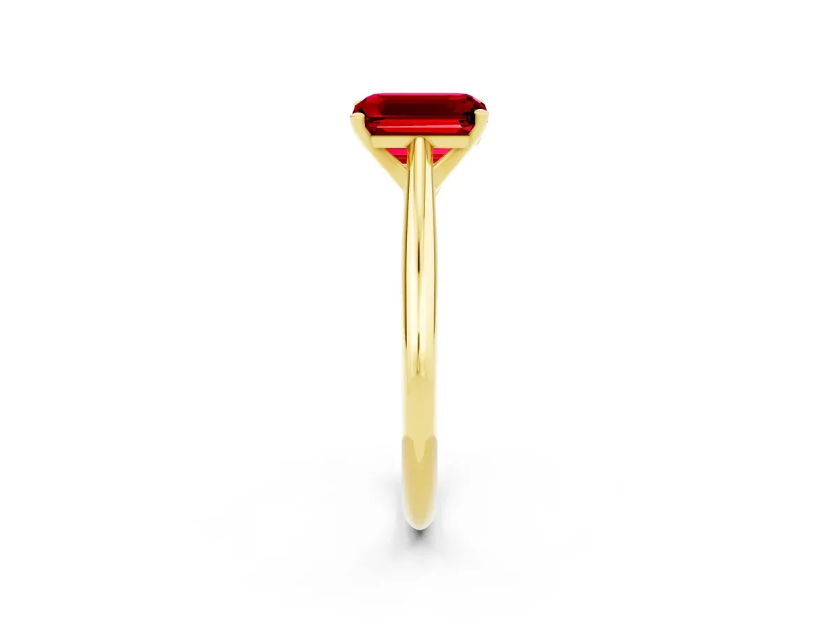 Emerald Cut Ruby Solitaire Engagement Ring with Cathedral Setting and Four-Prong Mount Yellow gold