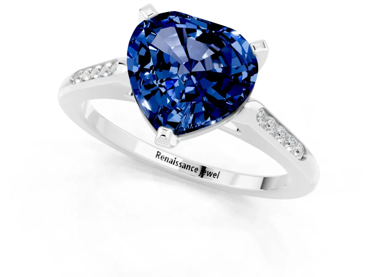Heart Cut Blue Sapphire Solitaire Ring with Channel Set Round Band and Prong Setting Silver