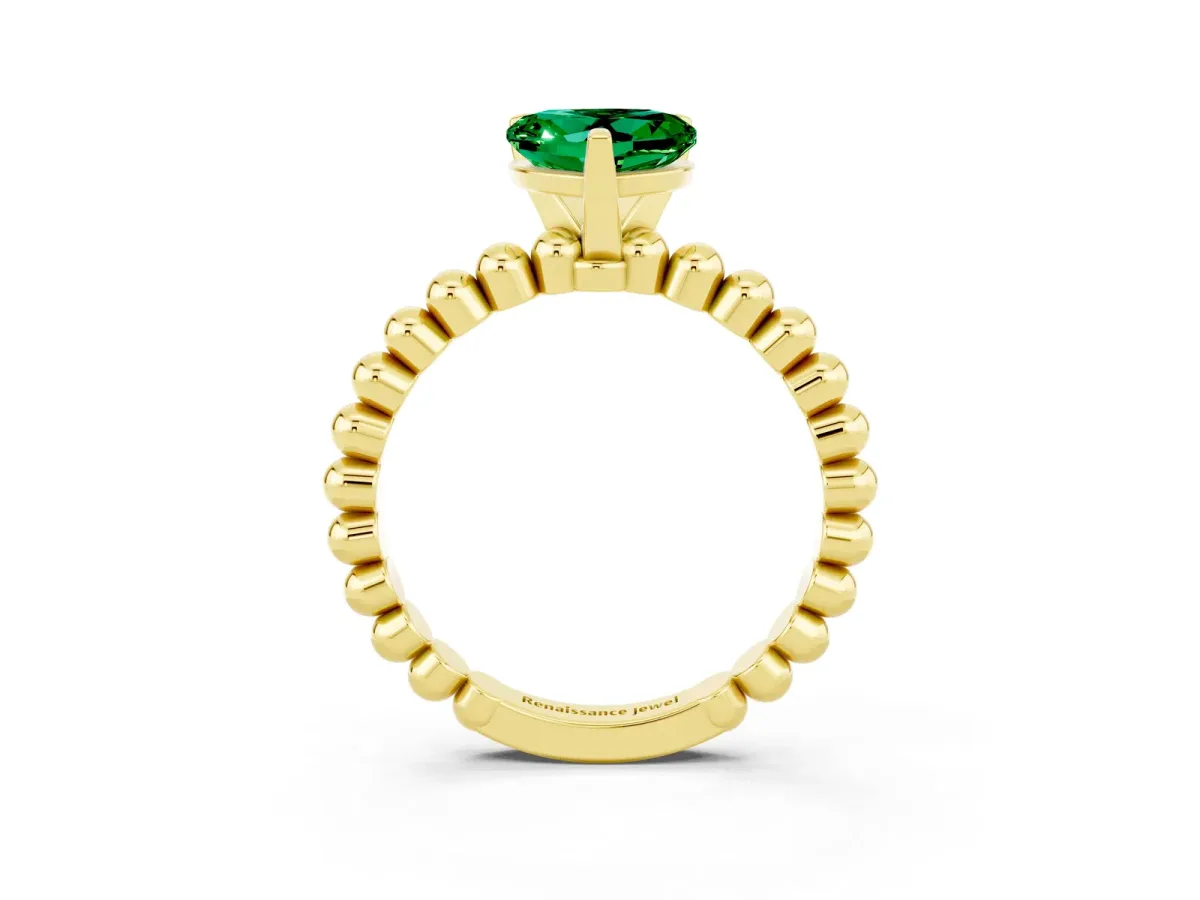 Heart Cut Emerald Solitaire Ring with Beaded Band and Prong Setting Yellow gold