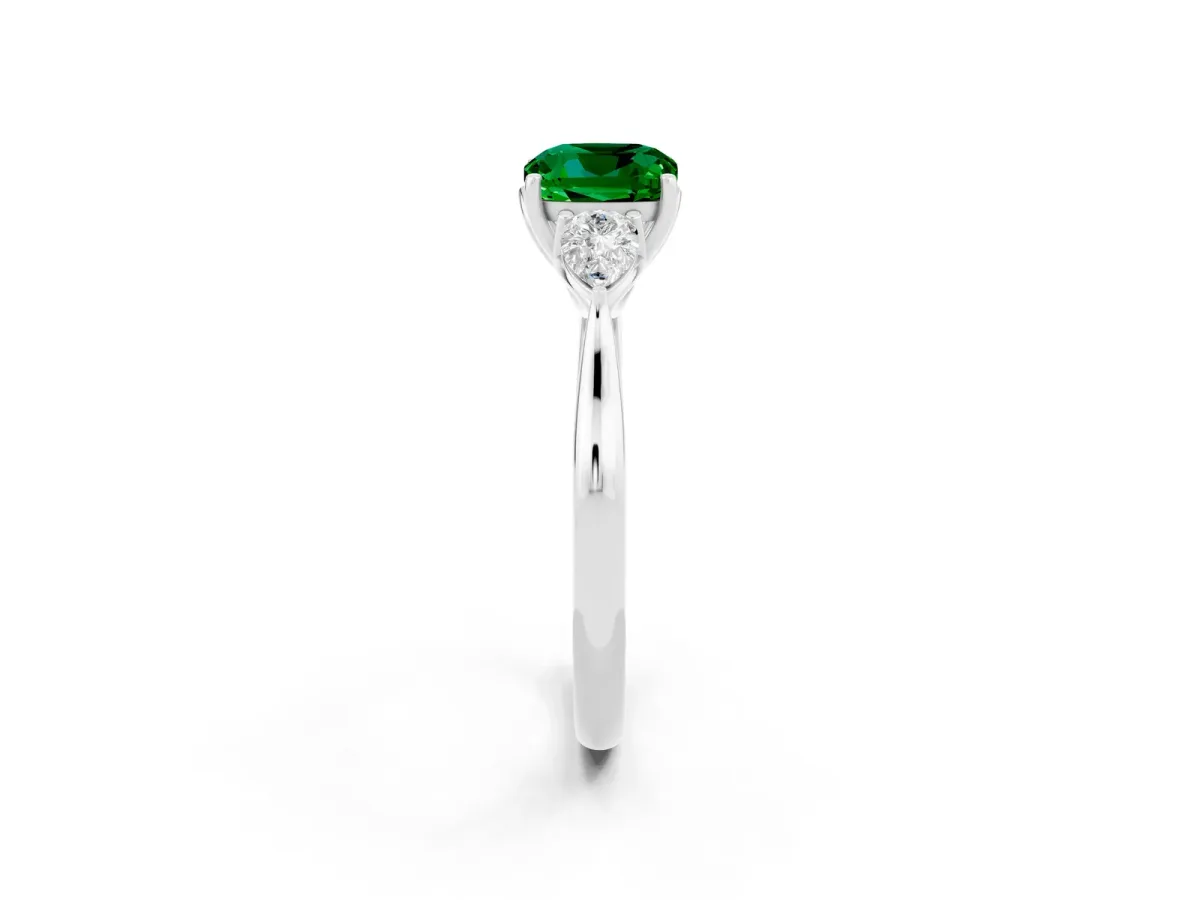 Three-Stone Cushion Cut Emerald Ring with Pear Side Stones in Four-Prong Setting White gold