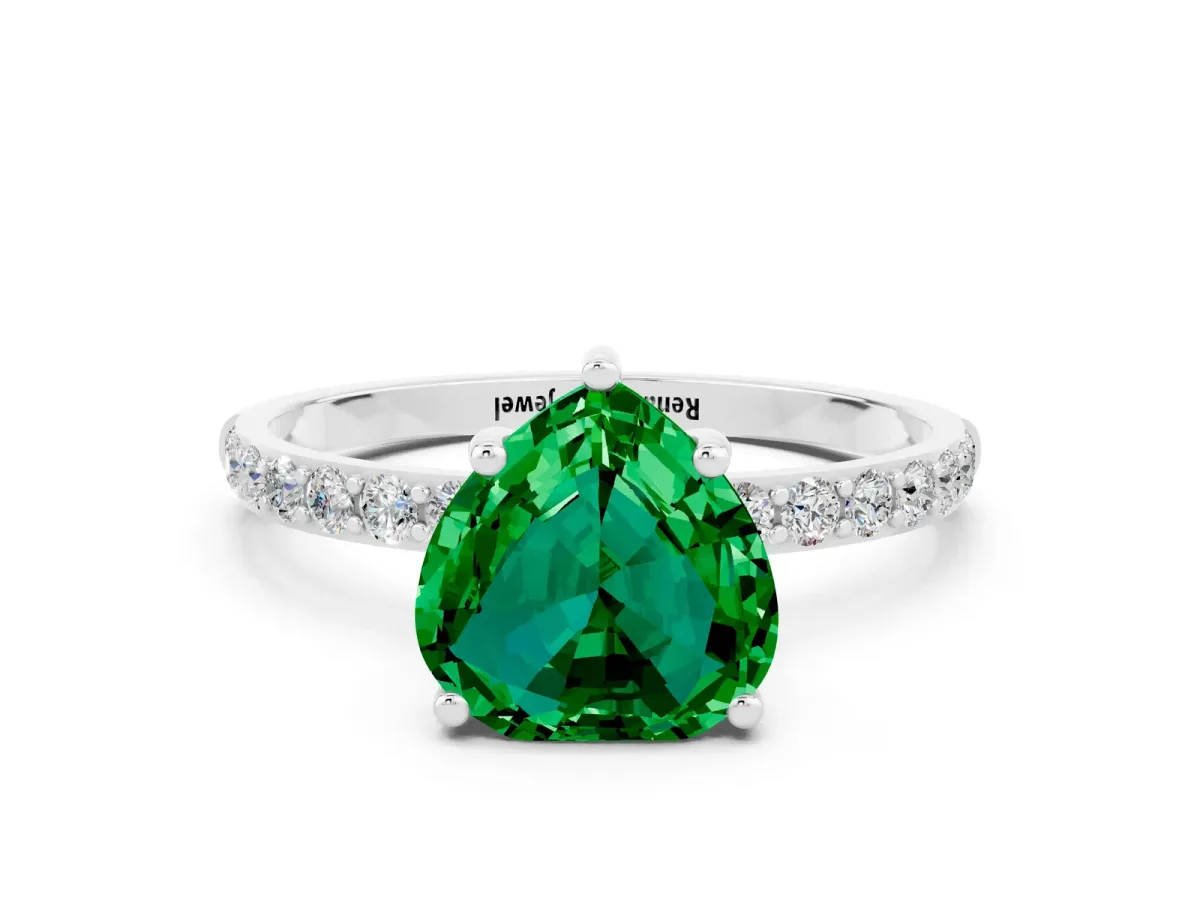 Heart Cut Emerald Solitaire Ring with Round Pavé Band and Prong Setting Silver