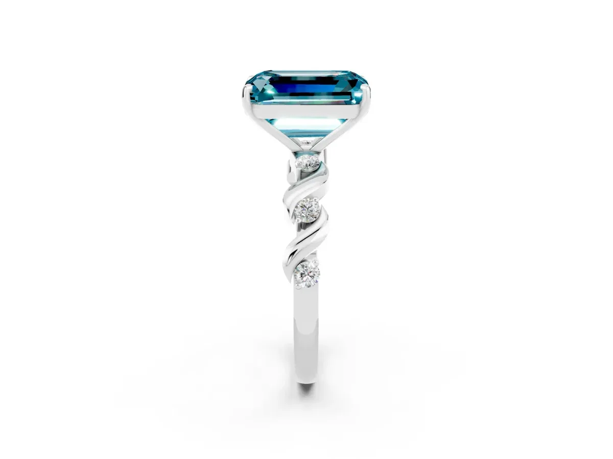 Emerald Cut Blue Topaz Solitaire Twisted Band with Round Accents and Prong Setting Silver