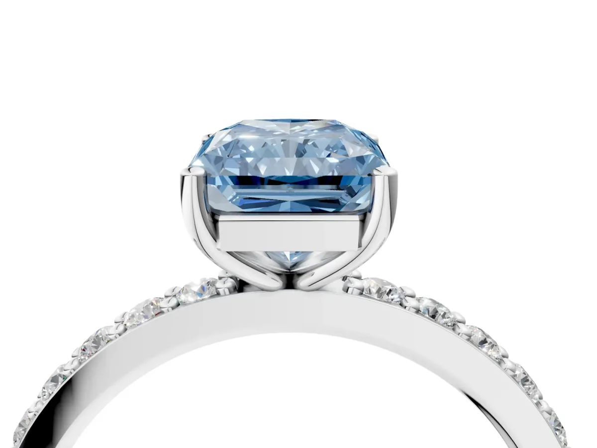 Fancy Blue Radiant Cut Cut Diamond Solitaire with Pave Band and Four-Prong Setting Platinum