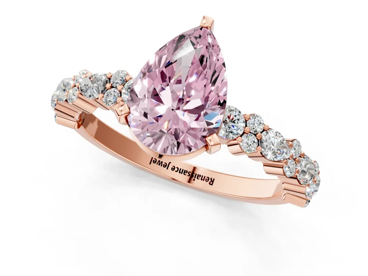 Fancy Pink Pear Cut Diamond Side Stone Solitaire Ring with Round and Four-Prong Setting Rose gold