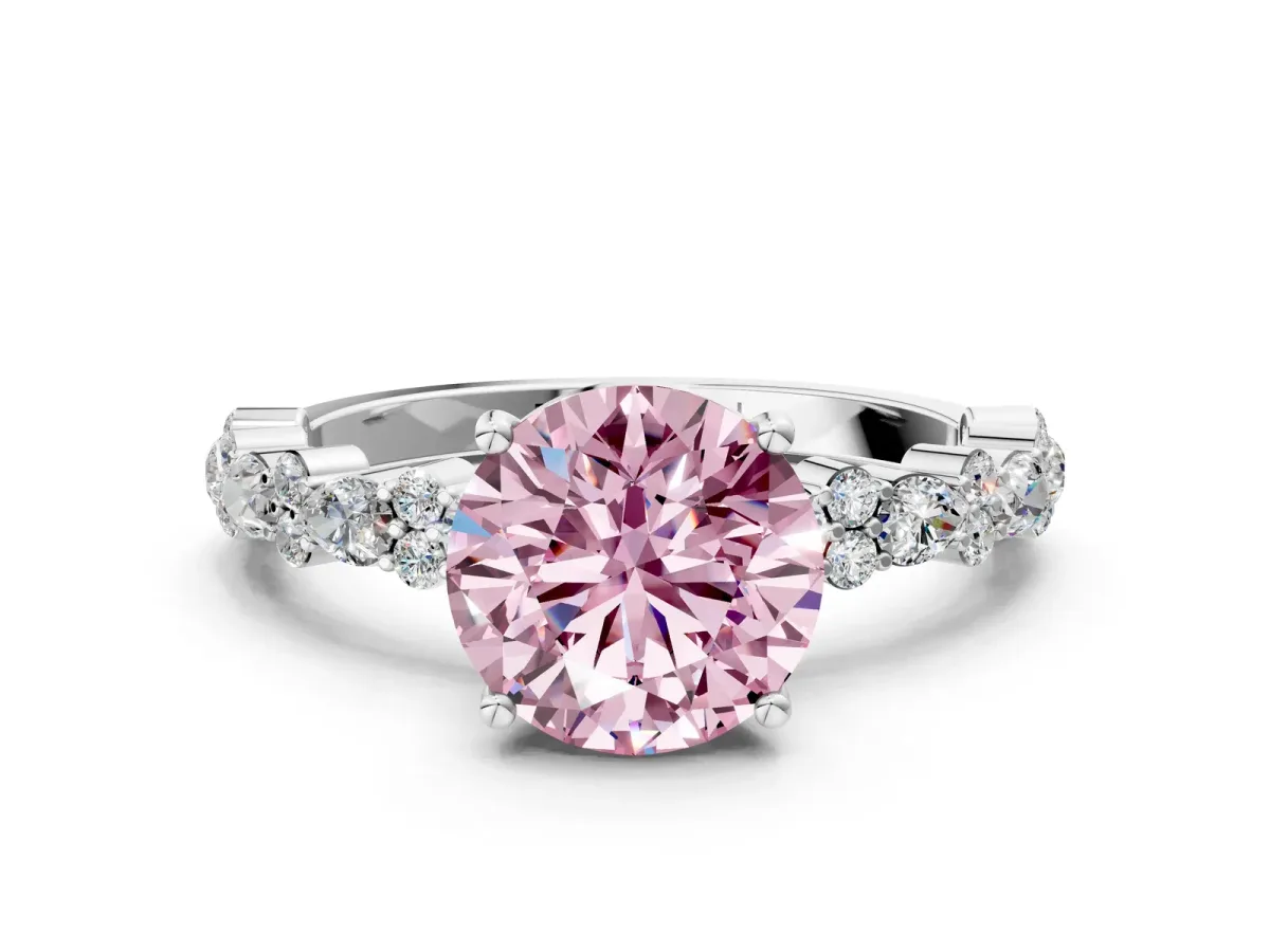 Fancy Pink Round Cut Diamond Side Stone Solitaire Ring with Round and Four-Prong Setting Silver
