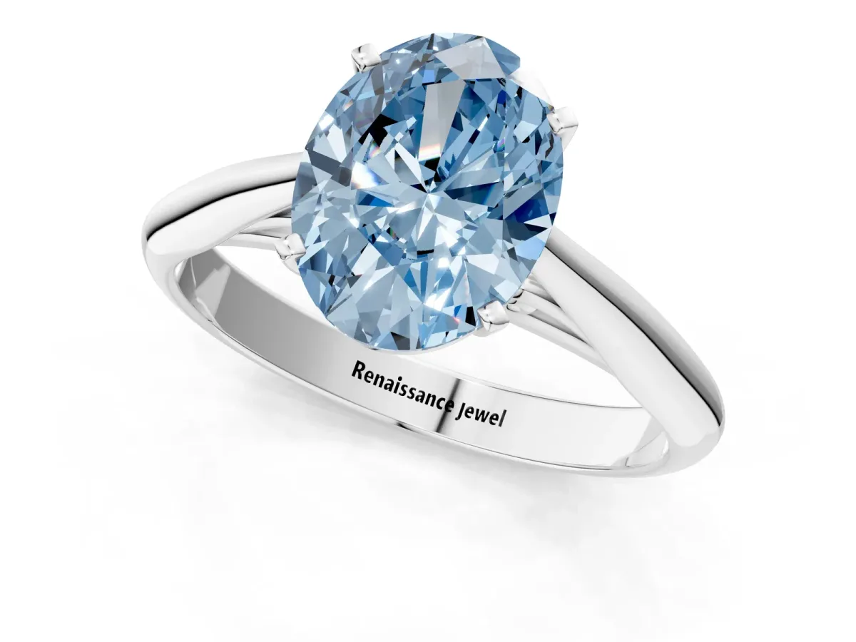 Fancy Blue Oval Cut Diamond Solitaire Engagement Ring with Cathedral Setting and Four-Prong Mount White gold