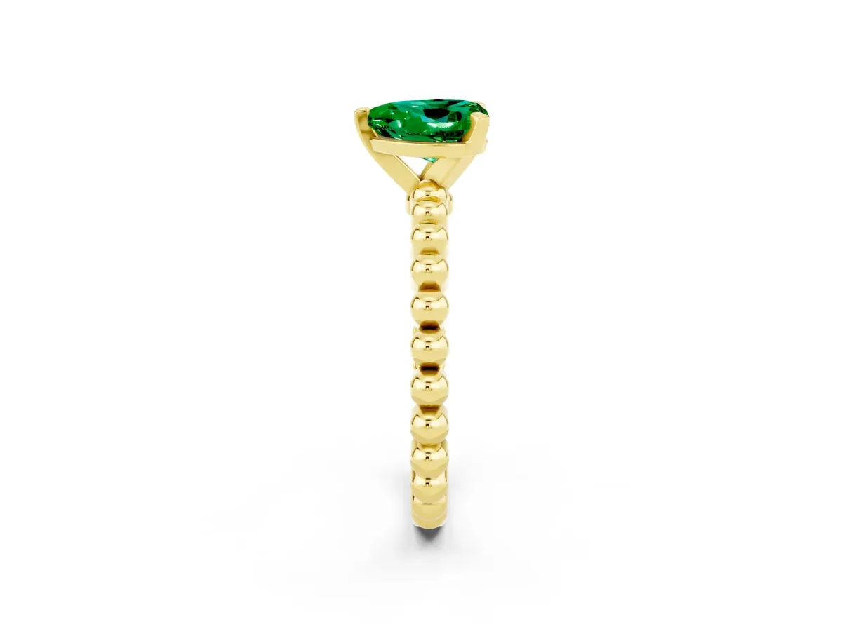 Heart Cut Emerald Solitaire Ring with Beaded Band and Prong Setting Yellow gold