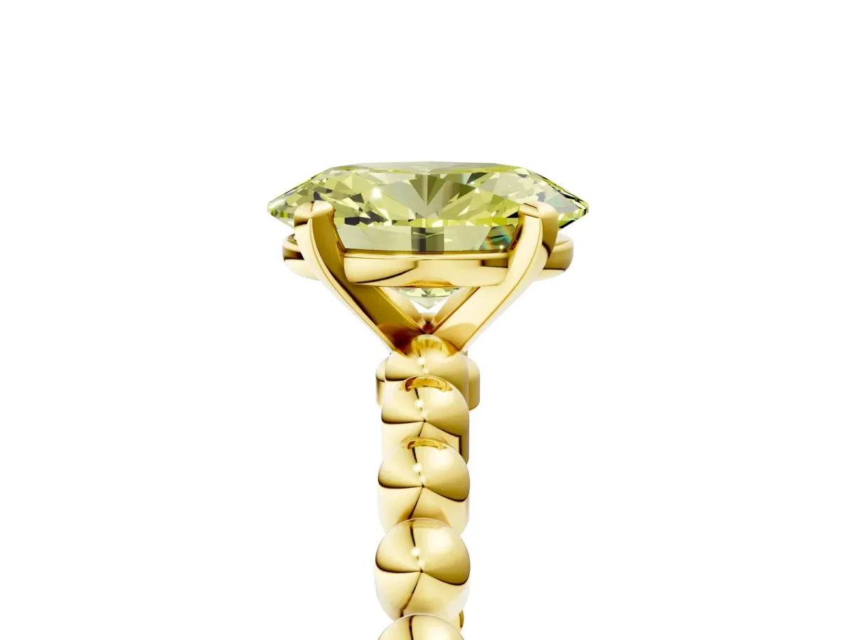 Fancy Yellow Oval Cut Diamond Solitaire Ring with Beaded Band and Prong Setting Yellow gold