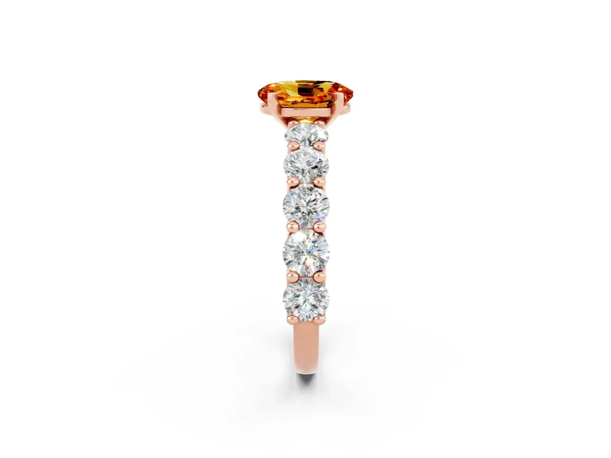 Oval Cut Citrine Prong Setting with Side Stones on a Pave Band Rose gold
