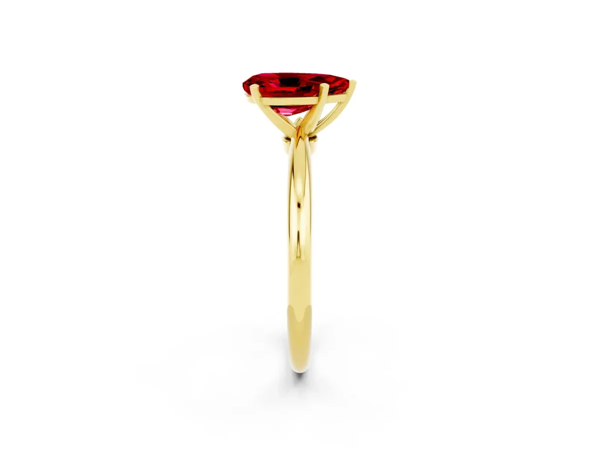 Pear Cut Ruby Solitaire Ring with Six-Prong Setting and Classic Band Yellow gold