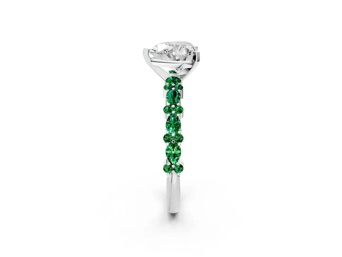 Heart Cut Diamond Side Stone Solitaire Ring with Round Emerald and Four-Prong Setting Platinum
