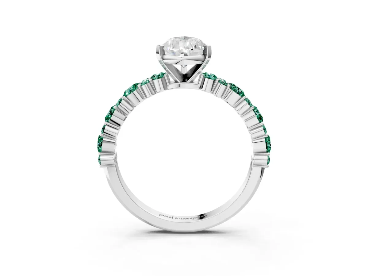 Pear Cut Diamond Side Stone Solitaire Ring with Round Green Sapphire and Four-Prong Setting Silver