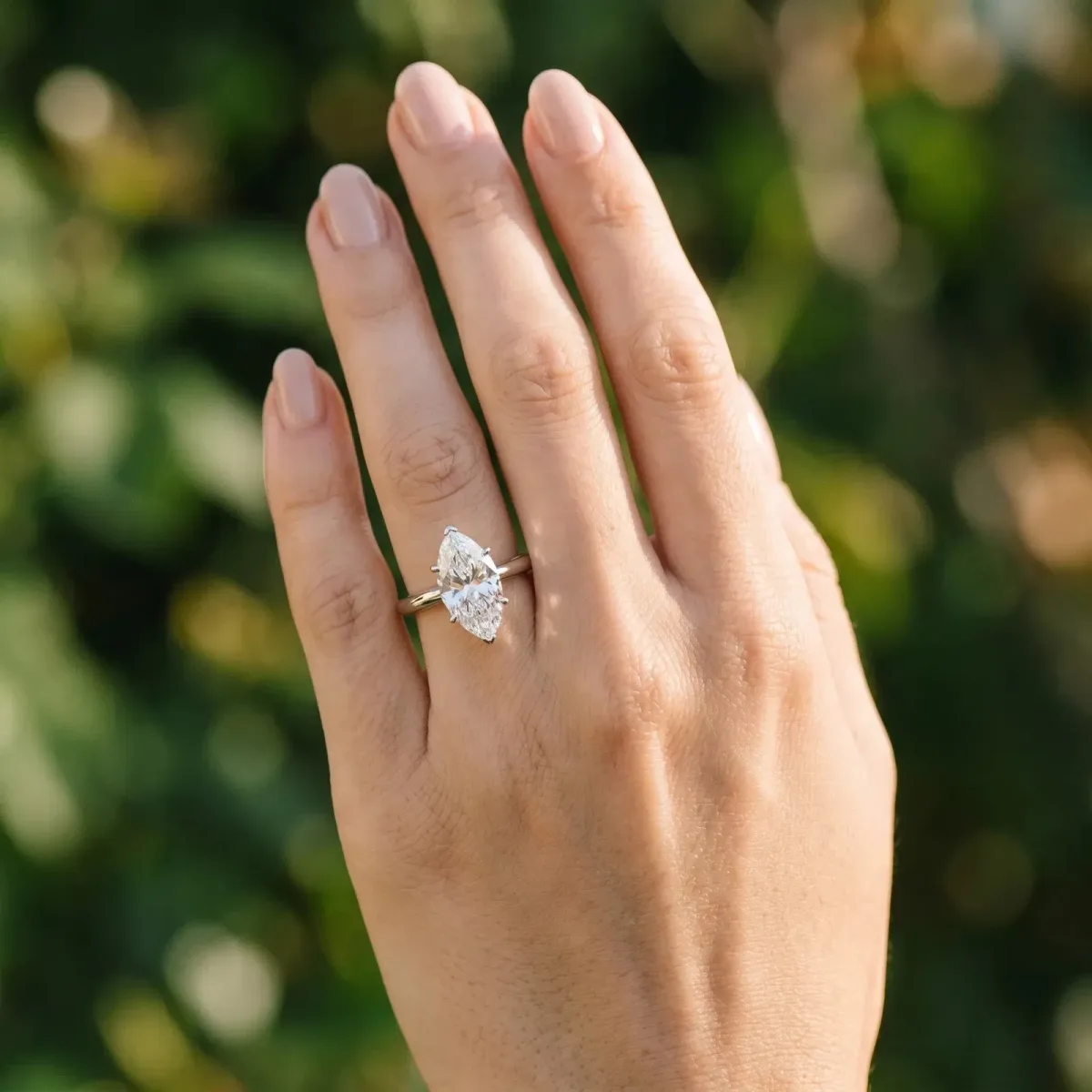 Marquise Cut Diamond Solitaire Engagement Ring with Classic Band and Four-Prong Setting Silver