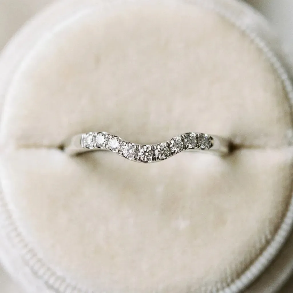 Curved Diamond Wedding Band with Round Cut Stones and Shared Prong Setting Silver