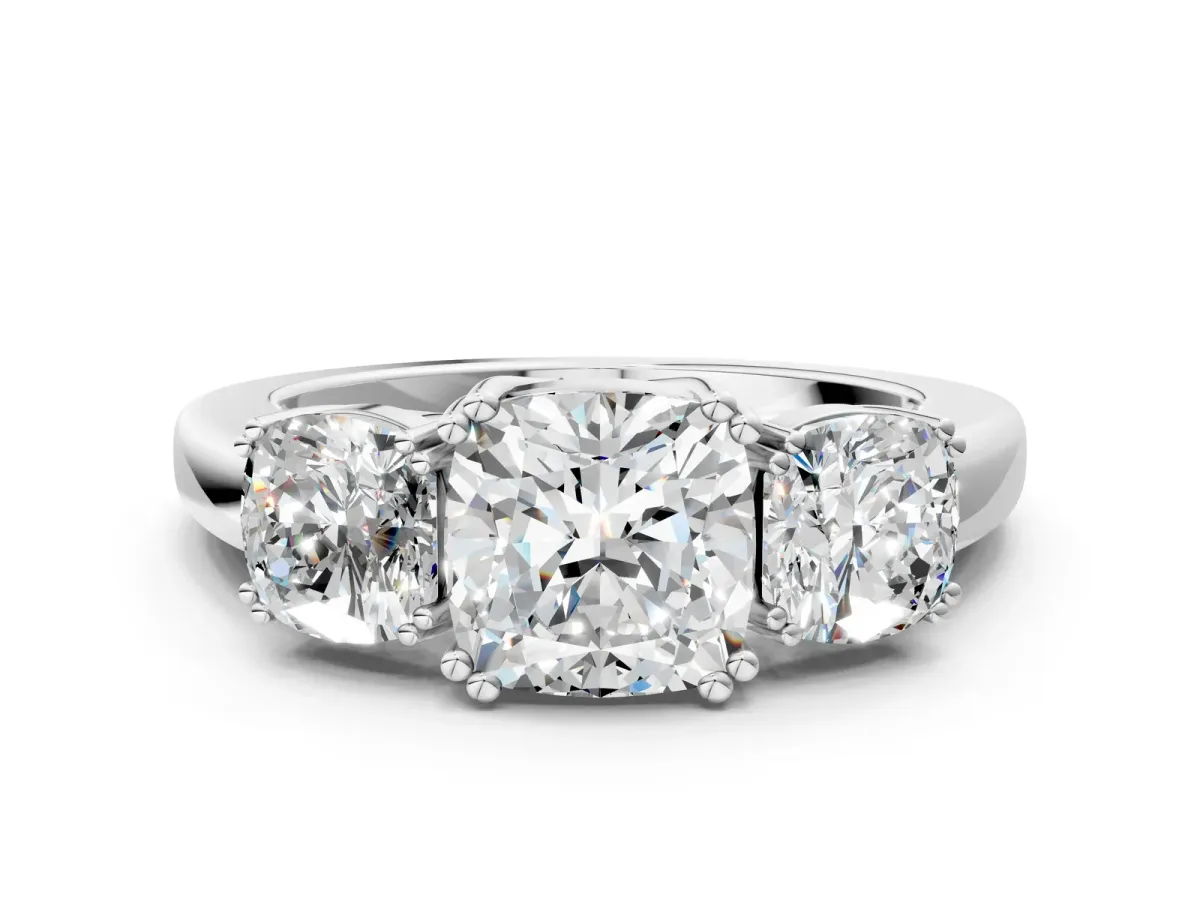 Three-Stone Cushion Cut Cut Diamond Ring with Channel Set Band and Four-Prong Setting White gold