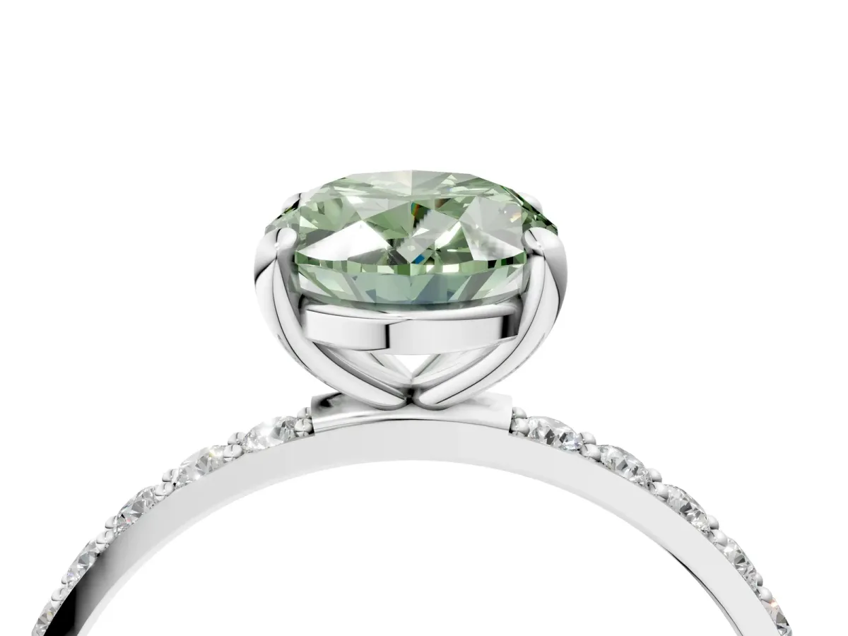 Fancy Green Oval Cut Diamond Solitaire Ring with Round Pavé Band and Prong Setting Silver
