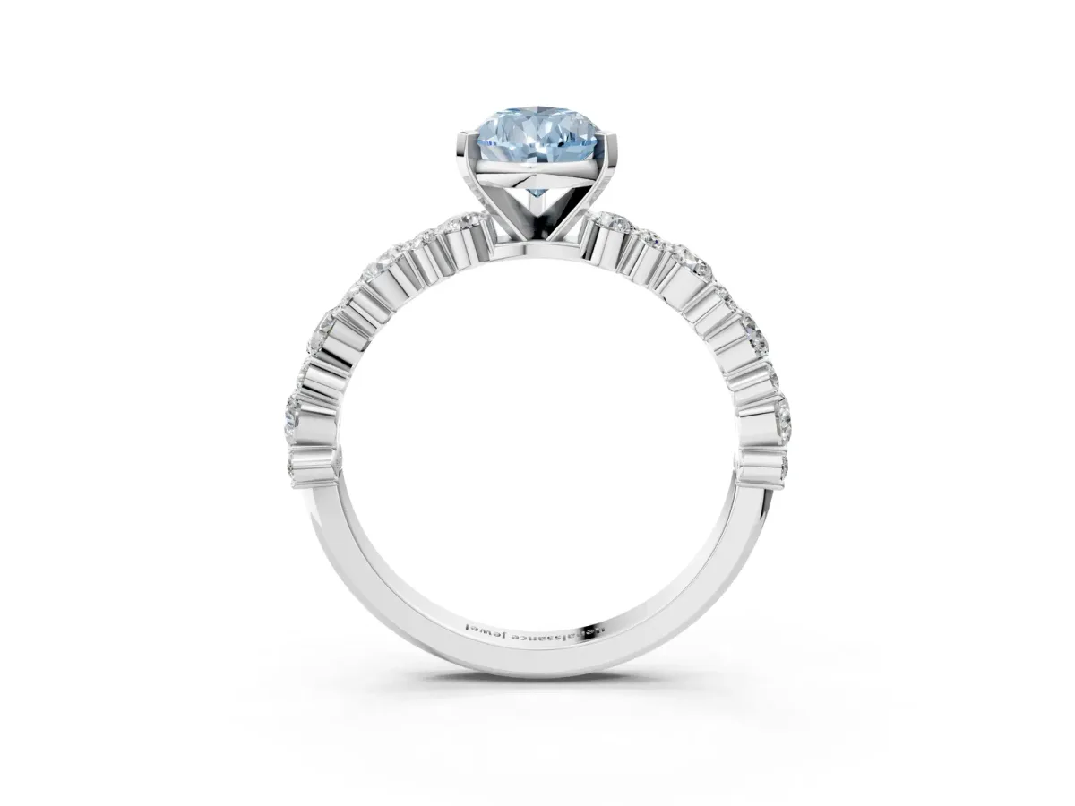 Fancy Blue Pear Cut Diamond Side Stone Solitaire Ring with Round and Four-Prong Setting White gold