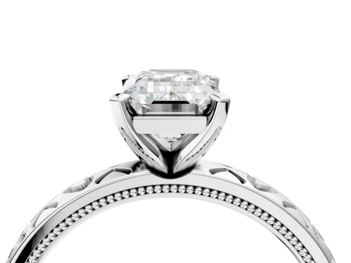 Emerald Cut Solitaire Diamond Engagement Ring with XO Engraved Band and Four-Prong Setting Platinum