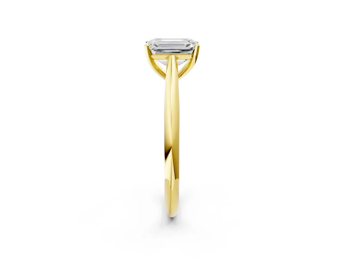 Emerald Cut Diamond Solitaire Engagement Ring with Cathedral Setting and Four-Prong Mount Yellow gold