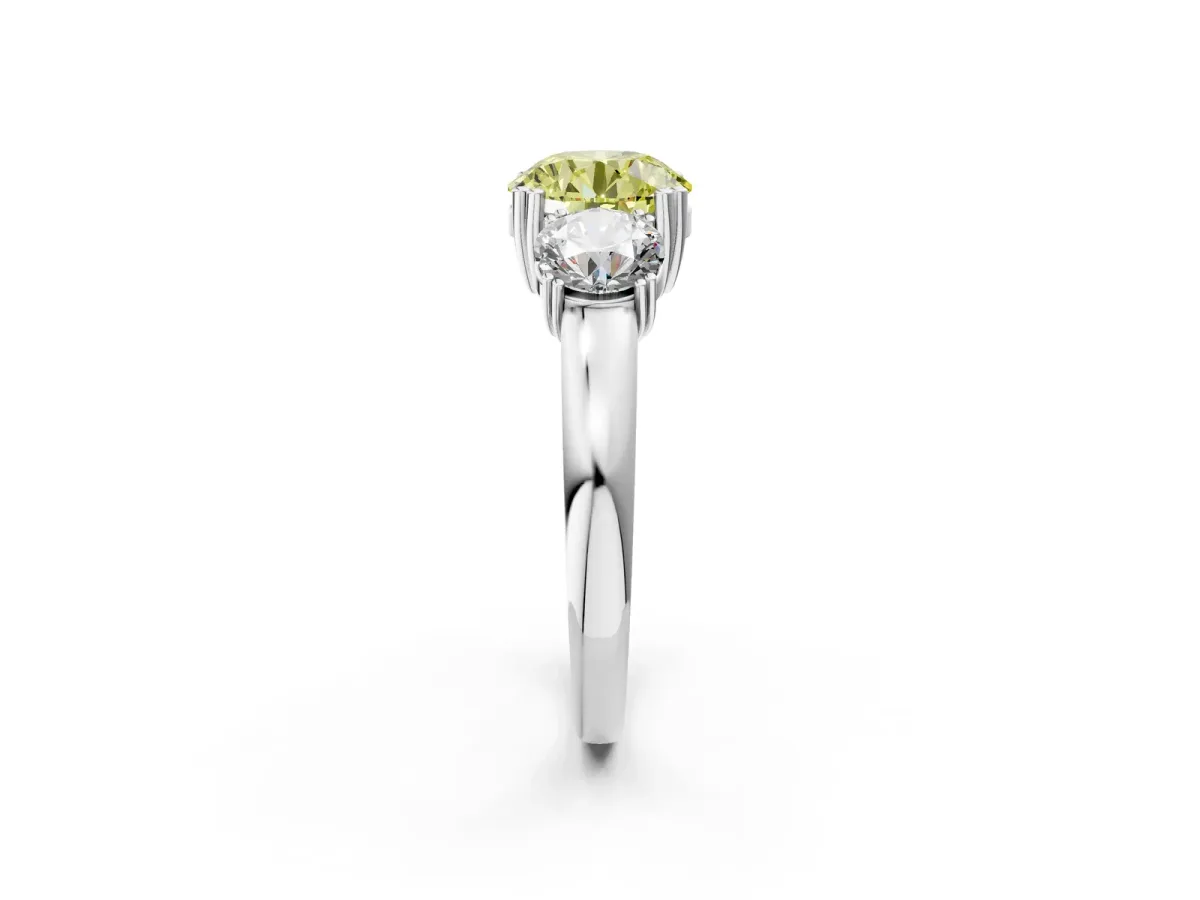 Fancy Yellow Three-Stone Round Cut Cut Diamond Ring with Channel Set Band and Four-Prong Setting Silver