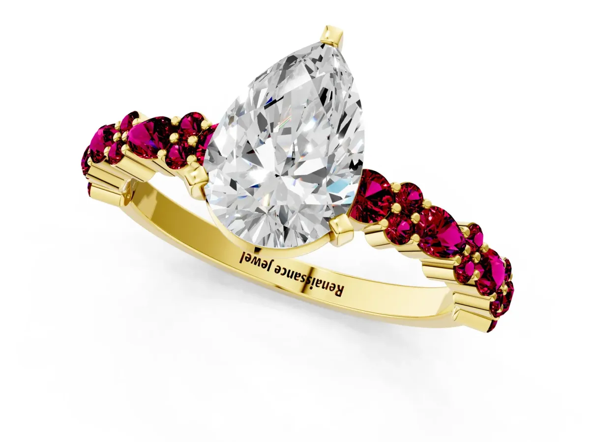 Pear Cut Diamond Side Stone Solitaire Ring with Round Garnet and Four-Prong Setting Yellow gold