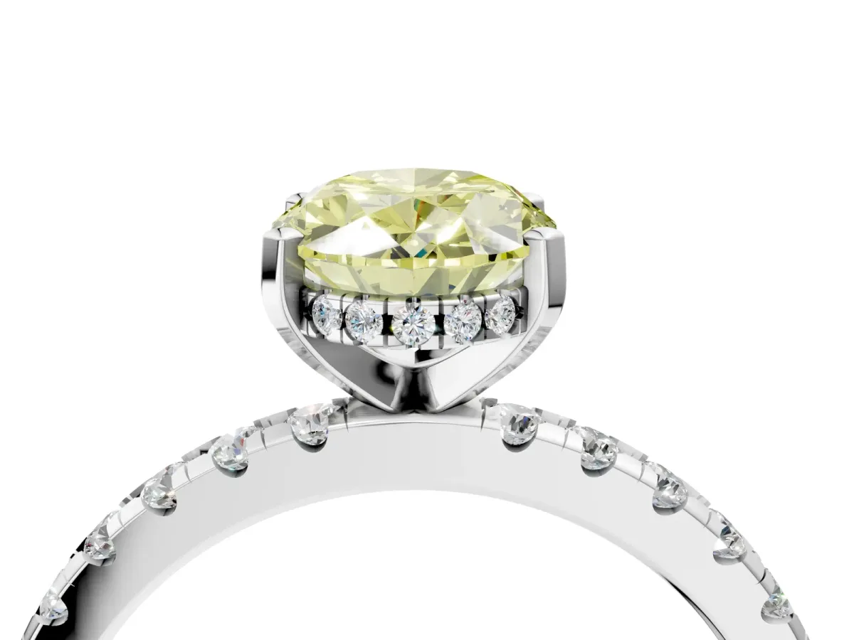 Fancy Yellow Oval Cut Diamond Solitaire Ring with Round Pavé Band and Four-Prong Setting Silver