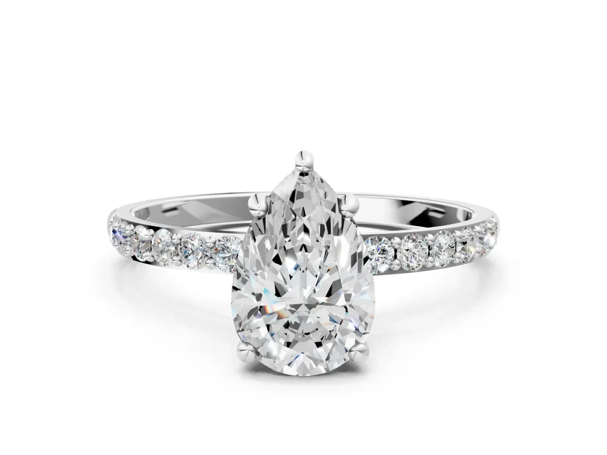 Pear Cut Diamond Solitaire Ring with Round Pavé Band and Prong Setting Silver